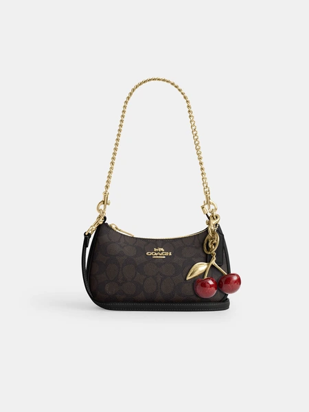 Мини-сумка Coach Teri с фирменным принтом