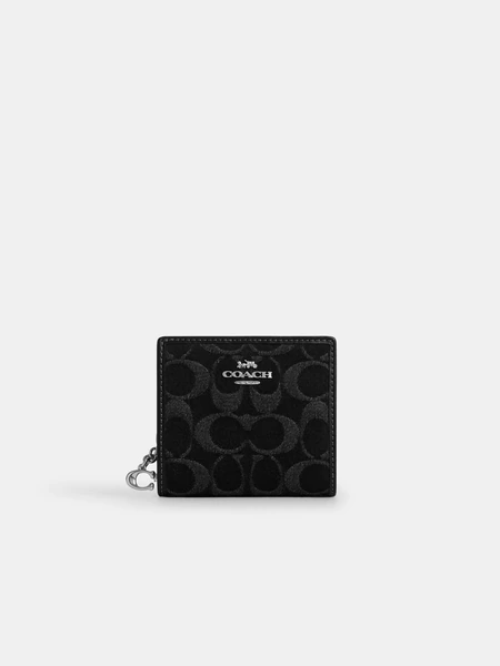 Компактный кошелек Coach на кнопке из фирменного денима