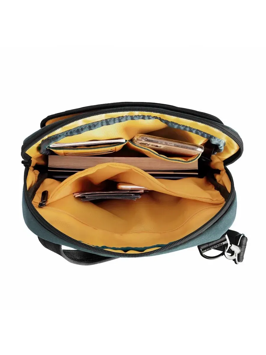 Противокражная сумка The Voyages Slim Crossbody Travelon — изображение 11 из 12, синий