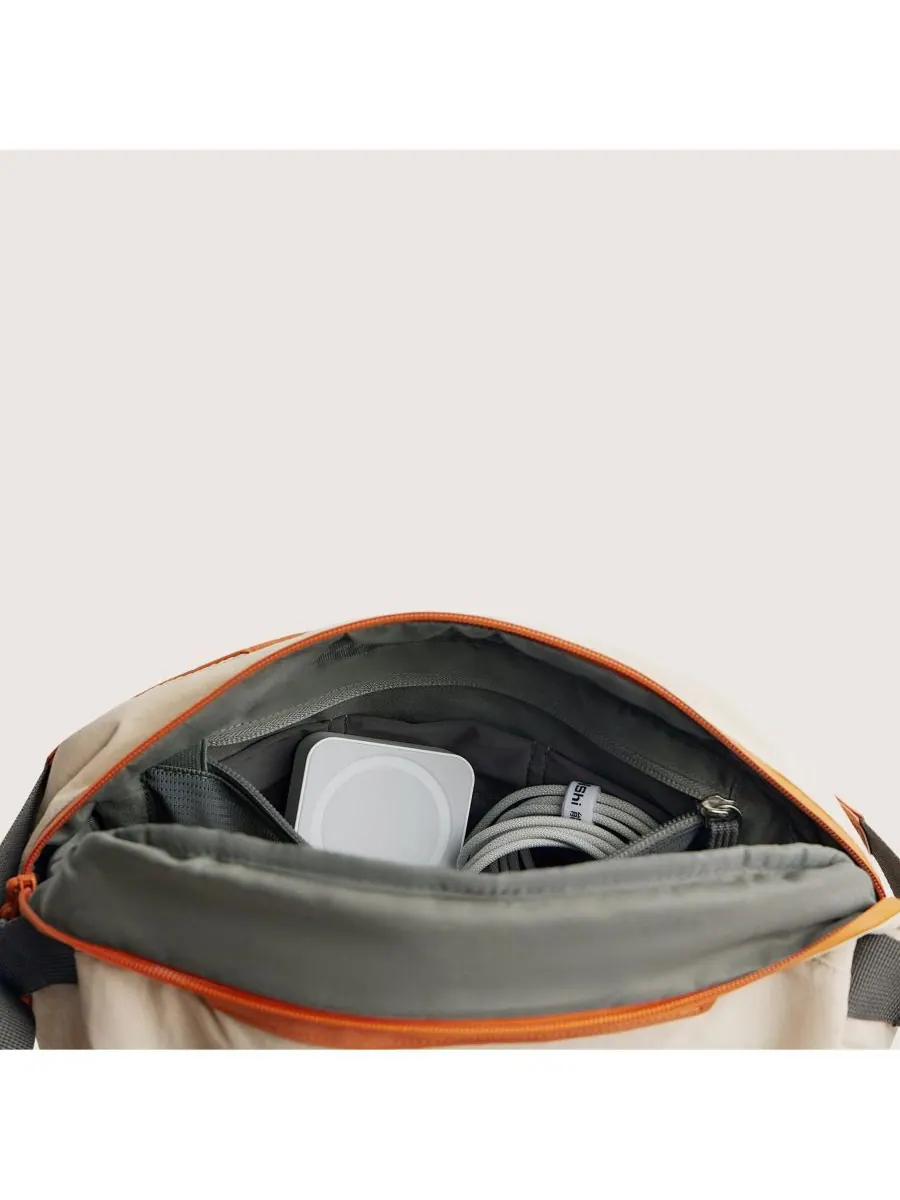 Сумка-слинг для фотоаппарата Soar 6 л с держателем для штатива, оранжевая BAGSMART — изображение 9 из 10, оранжевый