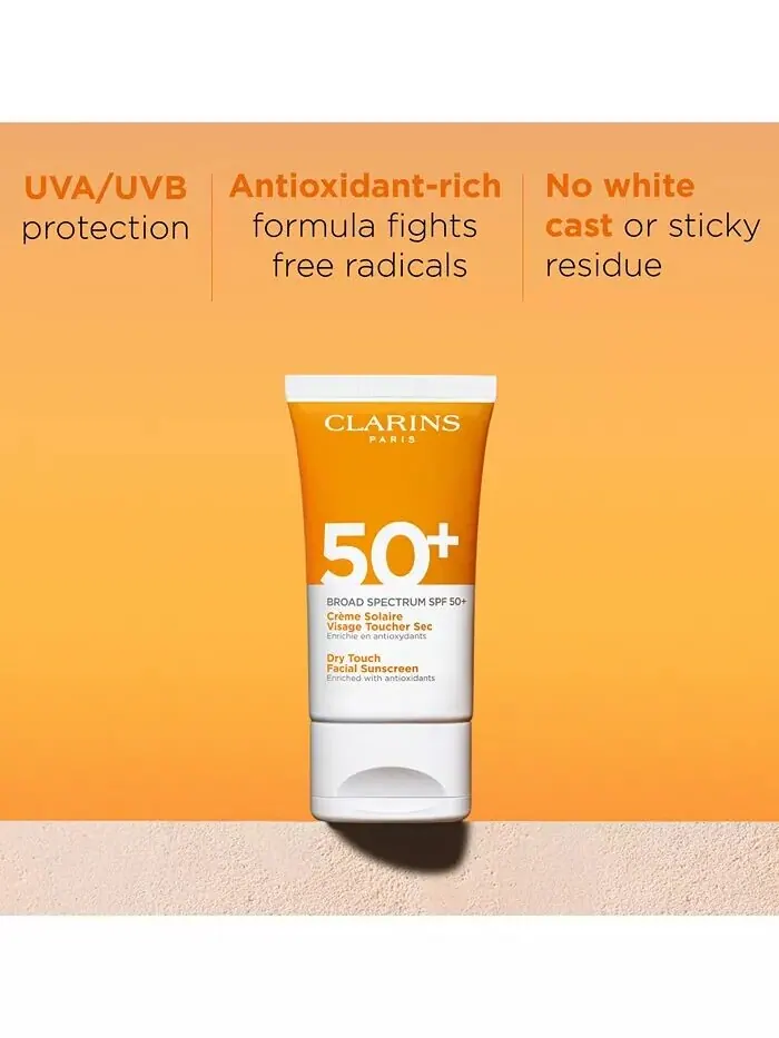 Солнцезащитный крем для лица Dry Touch широкого спектра SPF 50+, 1,7 унции Clarins — изображение 2 из 7