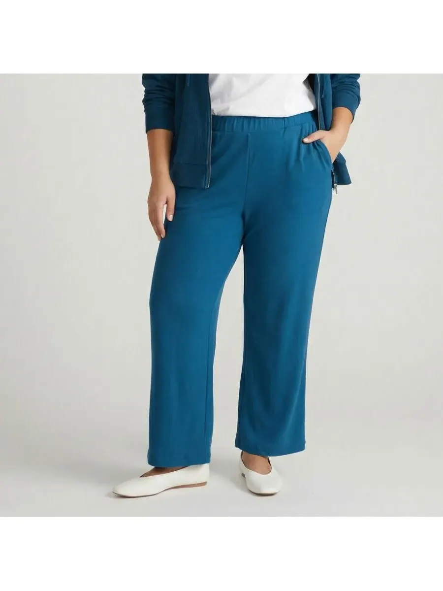 Брюки TravelKnit свободного кроя больших размеров Universal Standard, синий teal — изображение 1 из 3