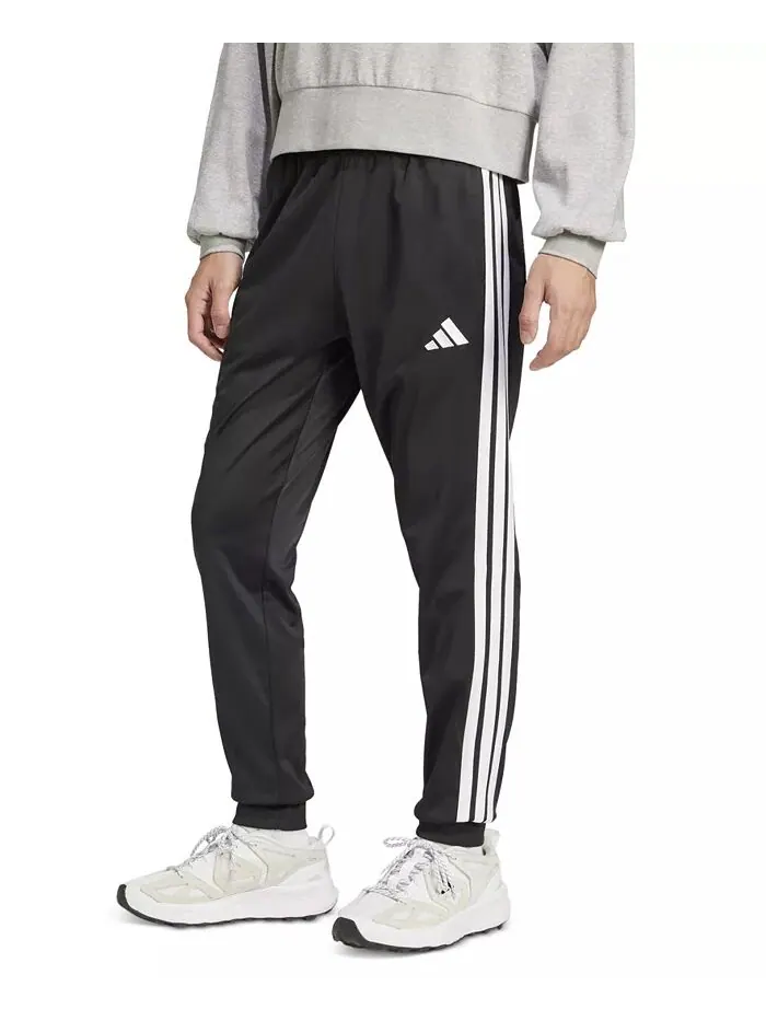 Мужские зауженные книзу спортивные брюки в полоску, стандартного кроя adidas — изображение 1 из 4, черный