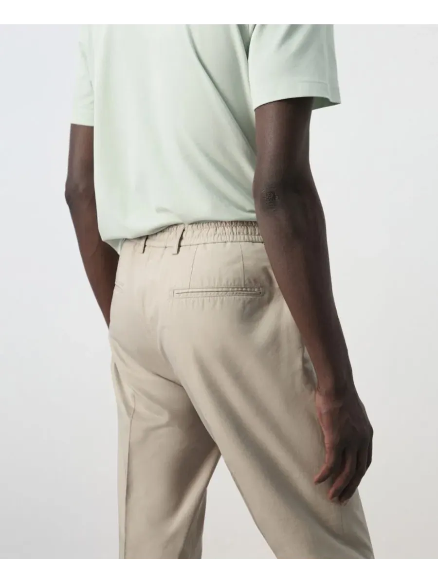 Брюки зауженные укороченные из хлопка и лиоцелла Slim Fit MANGO — изображение 5 из 7, коричневый