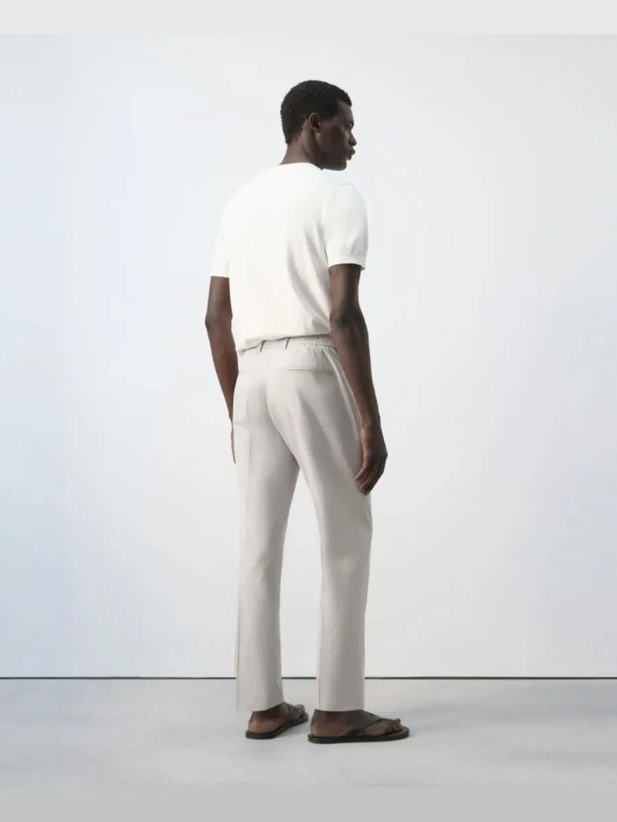 Брюки зауженные скинни Mango из хлопка и лиоцелла, Slim Fit — изображение 6 из 6, серый