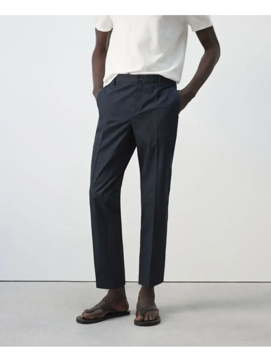 Брюки зауженные укороченные из хлопка и лиоцелла Slim Fit MANGO — изображение 1 из 7, темно-синий