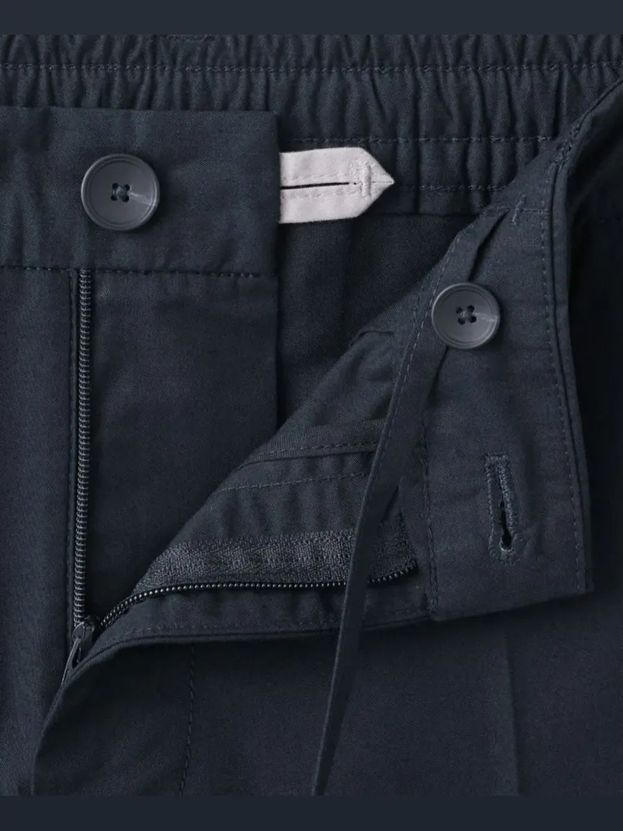 Брюки зауженные укороченные из хлопка и лиоцелла Slim Fit MANGO — изображение 3 из 7, темно-синий
