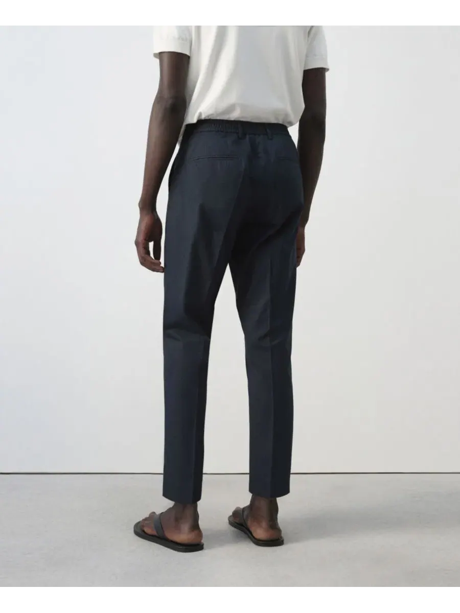 Брюки зауженные укороченные из хлопка и лиоцелла Slim Fit MANGO — изображение 7 из 7, темно-синий
