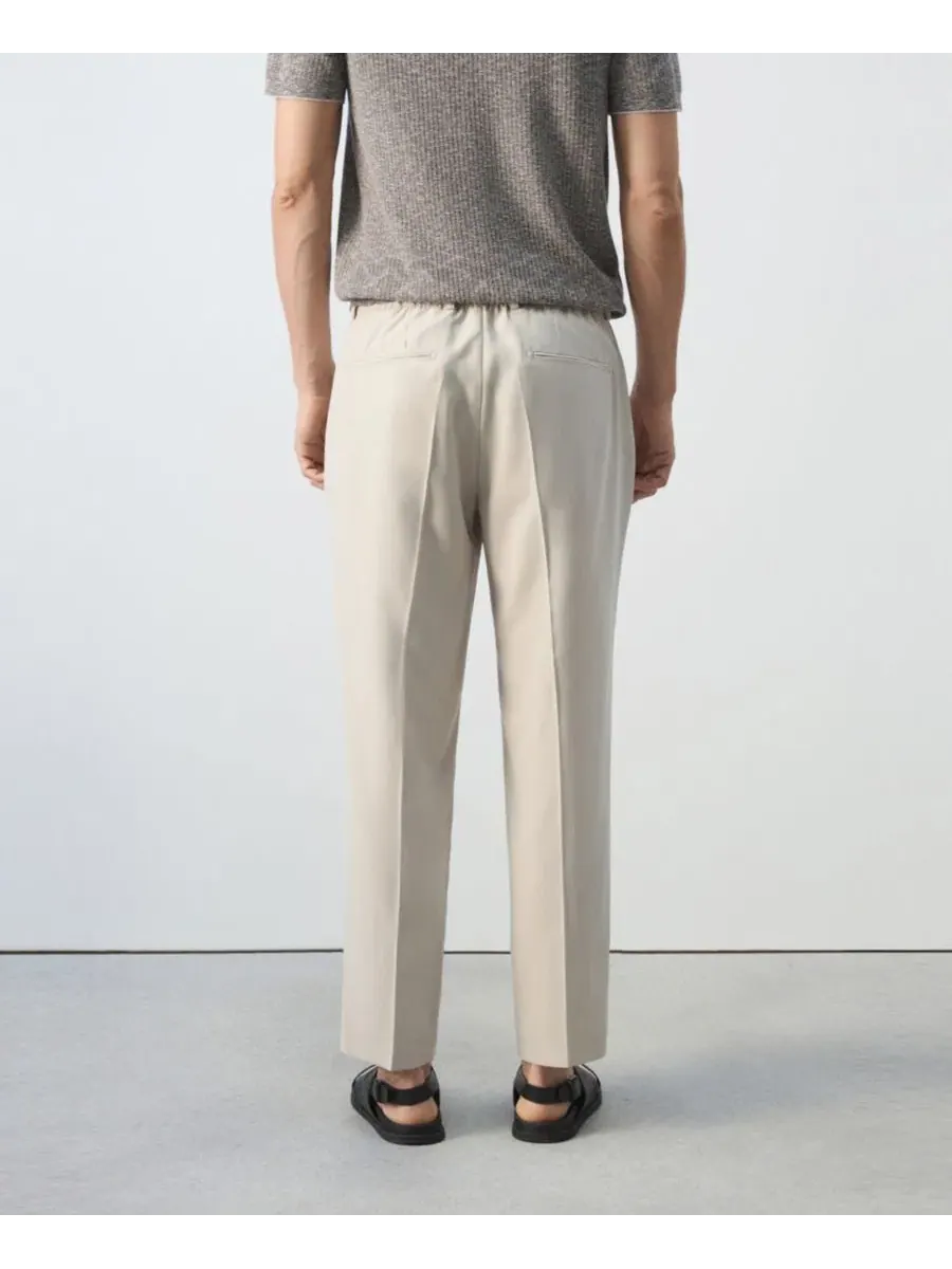 Брюки классические прямые с защипами, модель Regular-Fit Pleated MANGO — изображение 3 из 7, слоновая кость белый