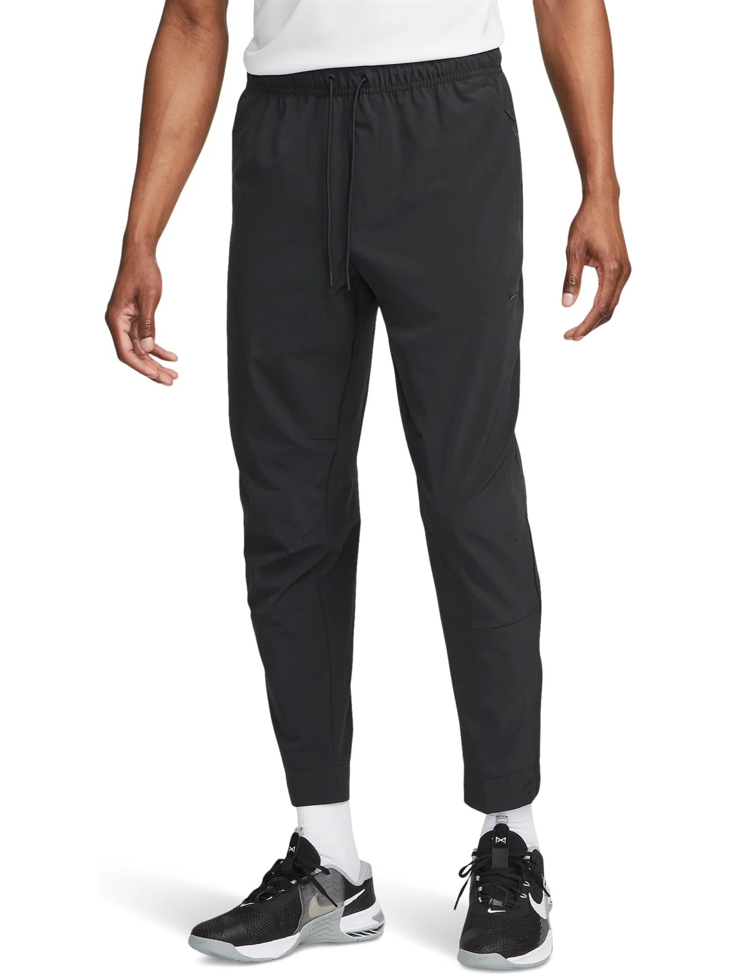 Мужские универсальные зауженные брюки Unlimited Dri-FIT Nike — 1