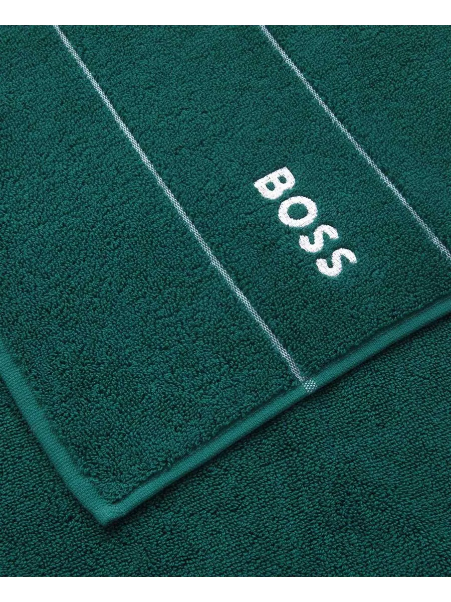 Однотонное хлопковое банное полотенце, 28 x 55 дюймов Boss Home — изображение 2 из 2, изумрудный