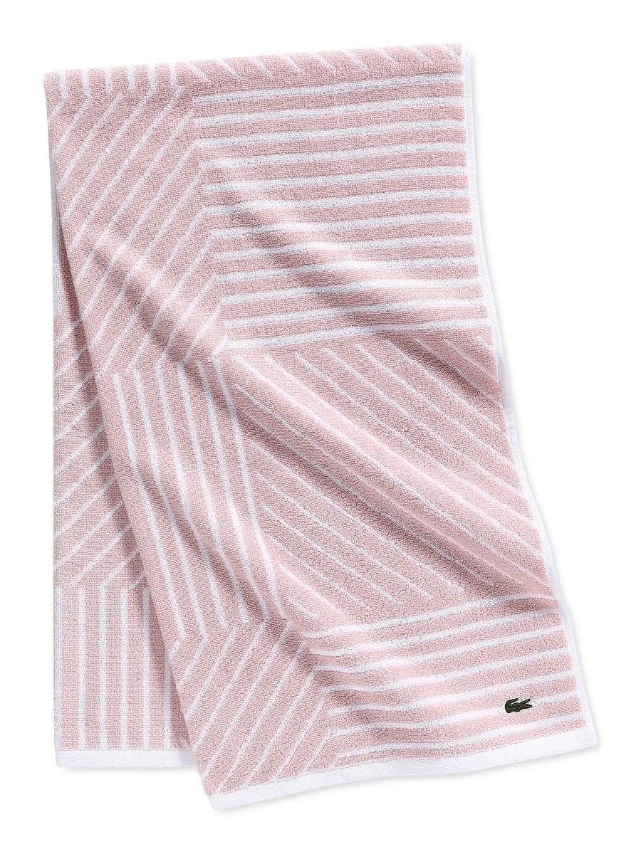 Банное полотенце Guethary, 76 x 137 см Lacoste Home — изображение 1 из 2, цветение
