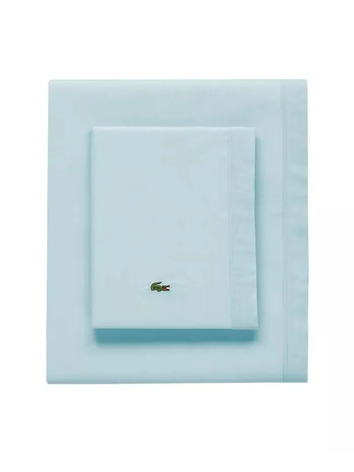 Твердый хлопковый перкаль 4 шт. Наборы простыней Lacoste Home — изображение 1 из 1, бледный голубой
