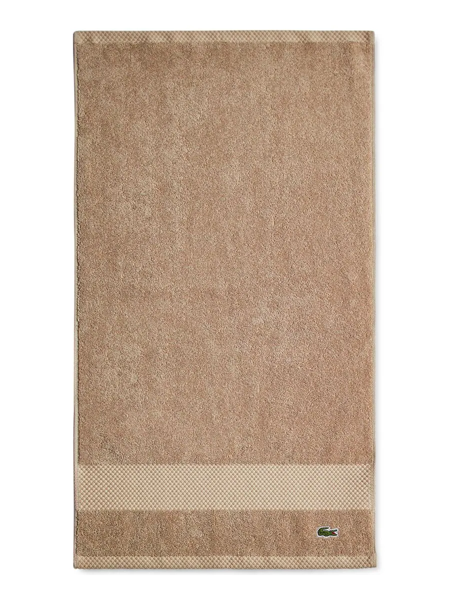 Антимикробное полотенце для рук Heritage из хлопка Supima, 40 см x 76 см Lacoste Home, Sand, Hand — изображение 1 из 10