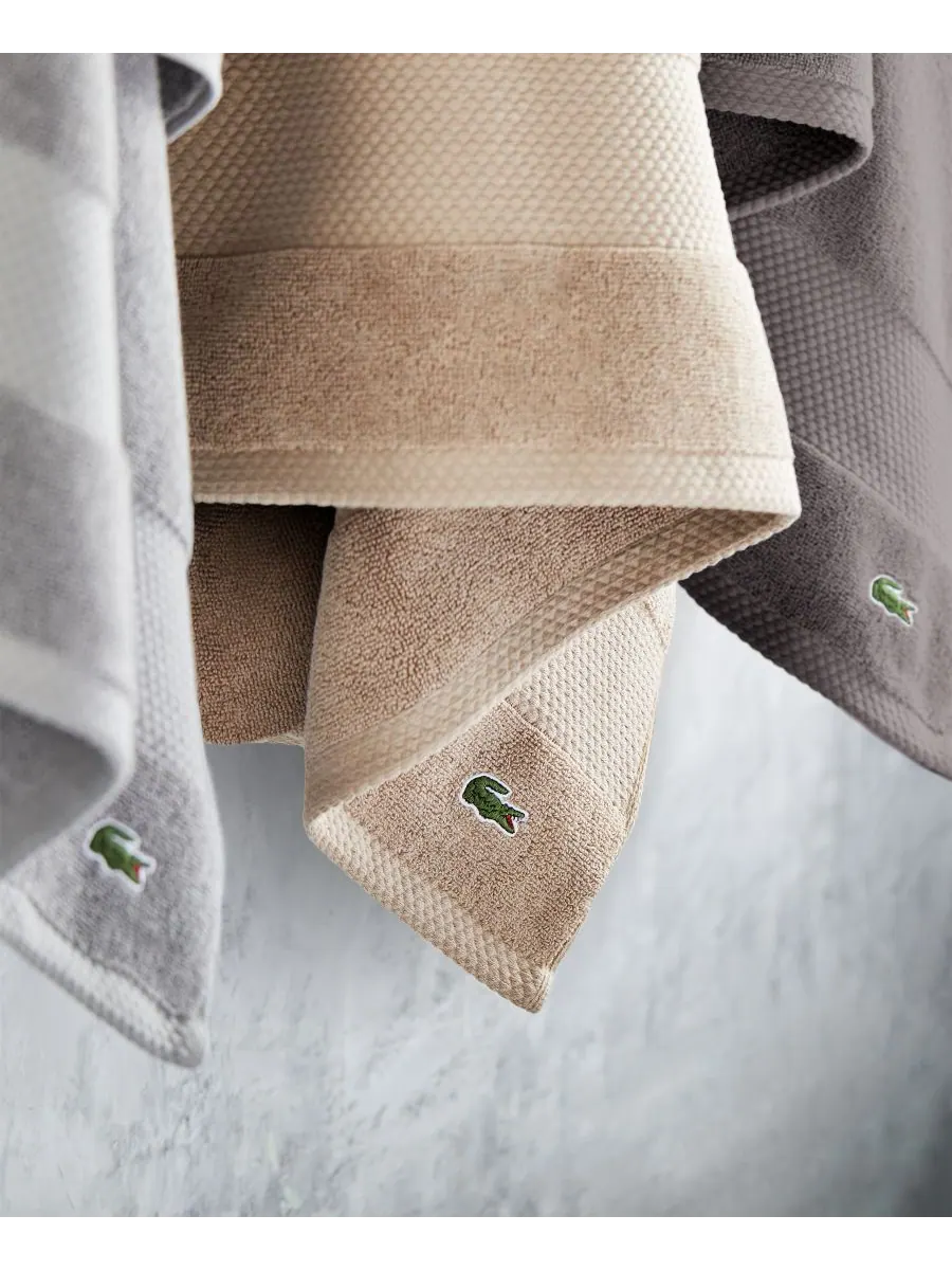 Антимикробное полотенце для рук Heritage из хлопка Supima, 40 см x 76 см Lacoste Home — изображение 9 из 10, джинсовый синий