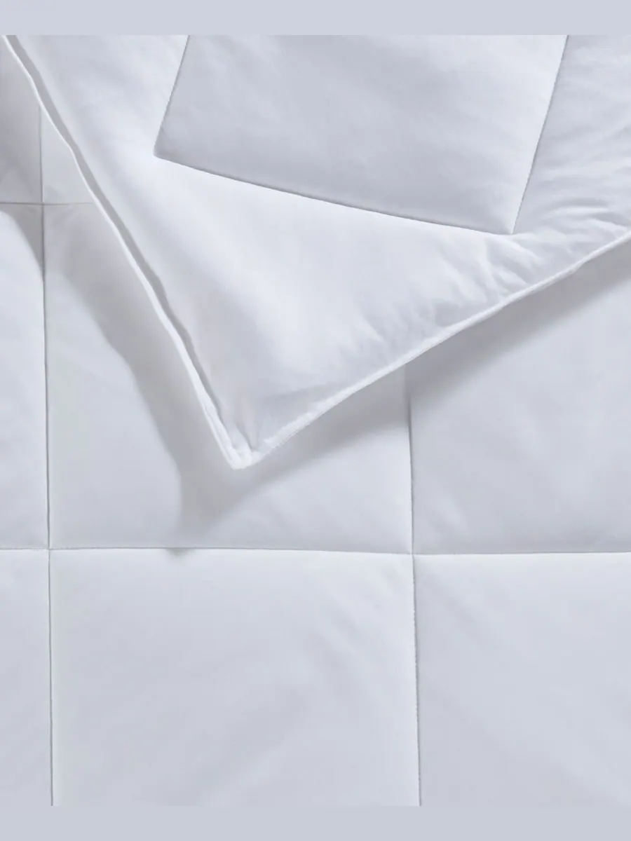 Охлаждающее одеяло Cooling Touch Oversized с наполнителем, имитирующим пух, размер Twin/Twin XL — изображение 9 из 10, белый