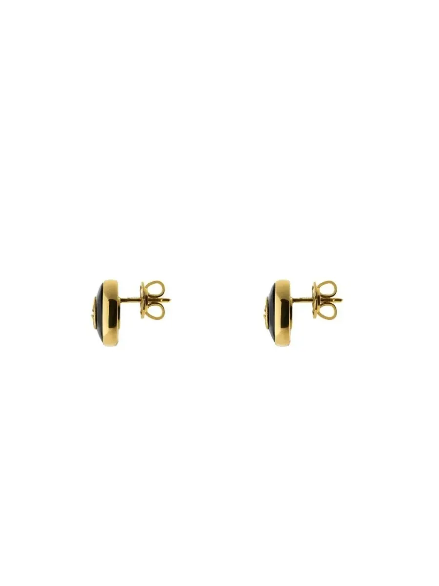 Серьги-гвоздики Gucci Interlocking из желтого золота 18 карат с черным ониксом - Ybd786554001 — изображение 2 из 2