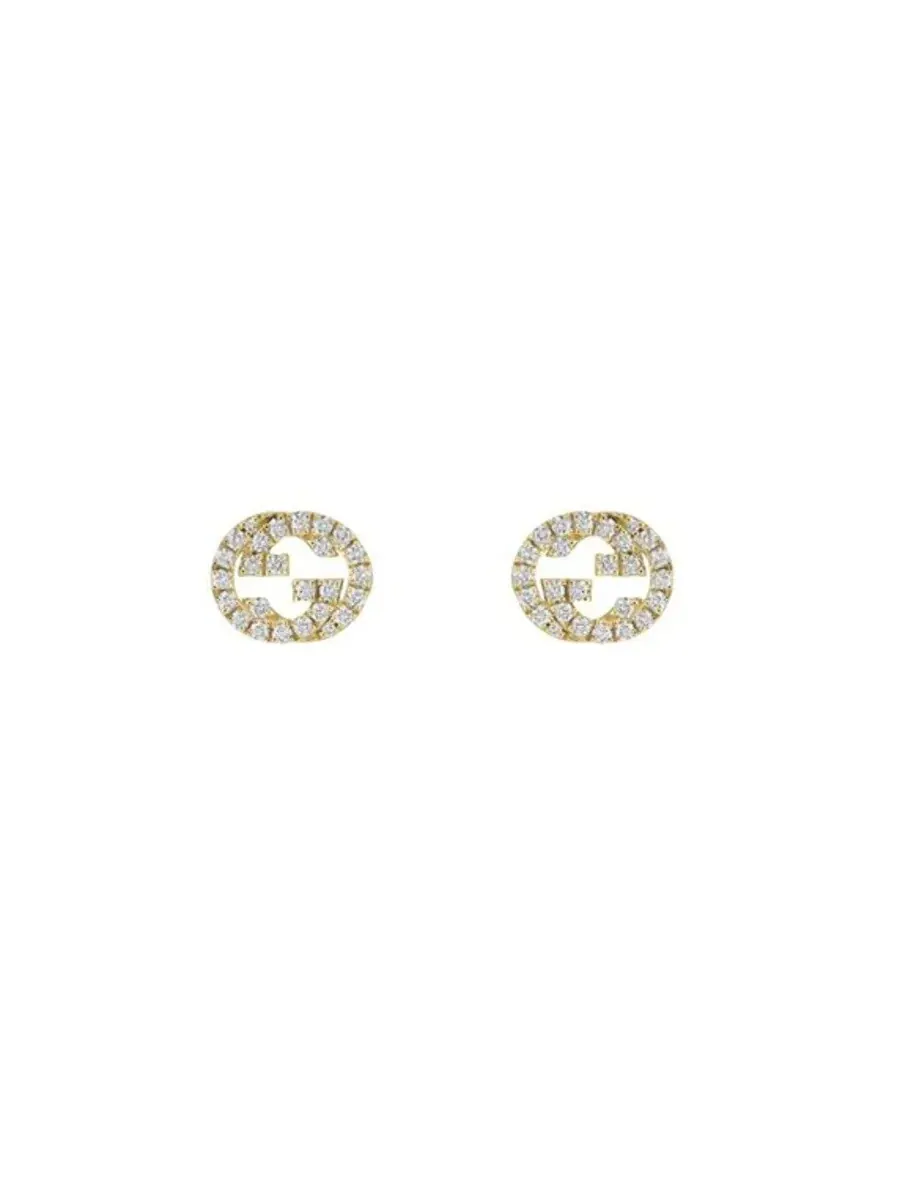 Серьги-гвоздики Gucci Interlocking G из желтого золота 18 карат с бриллиантом 0,38 карат - Ybd729408002