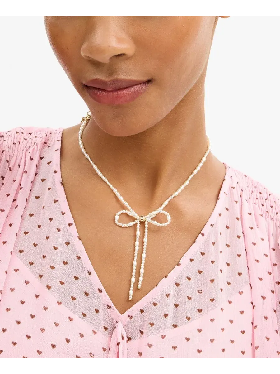 Колье-чокер с имитацией жемчуга в виде банта, модель Bow Choker COACH — изображение 4 из 4, оттенок прозрачный