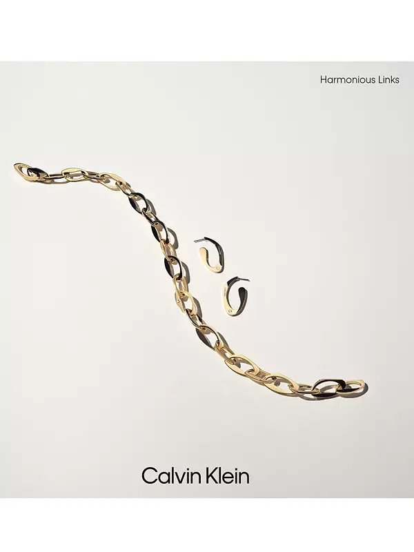 Средние скульптурные удлиненные серьги-кольца с паве Calvin Klein — изображение 4 из 4, оттенок золото