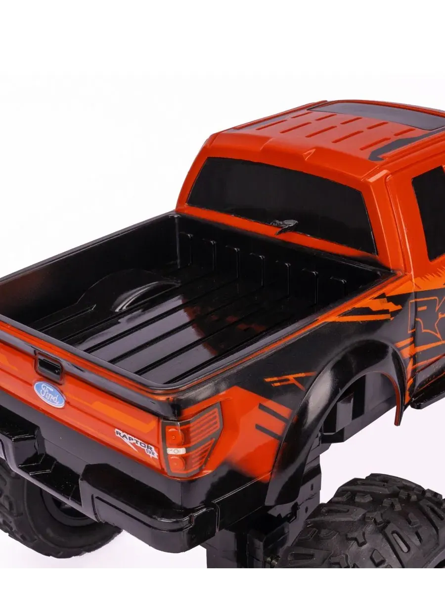 Лицензированная радиоуправляемая модель грузовика Ford F-150 SVT Raptor в масштабе 1:14 World Tech — изображение 4 из 14