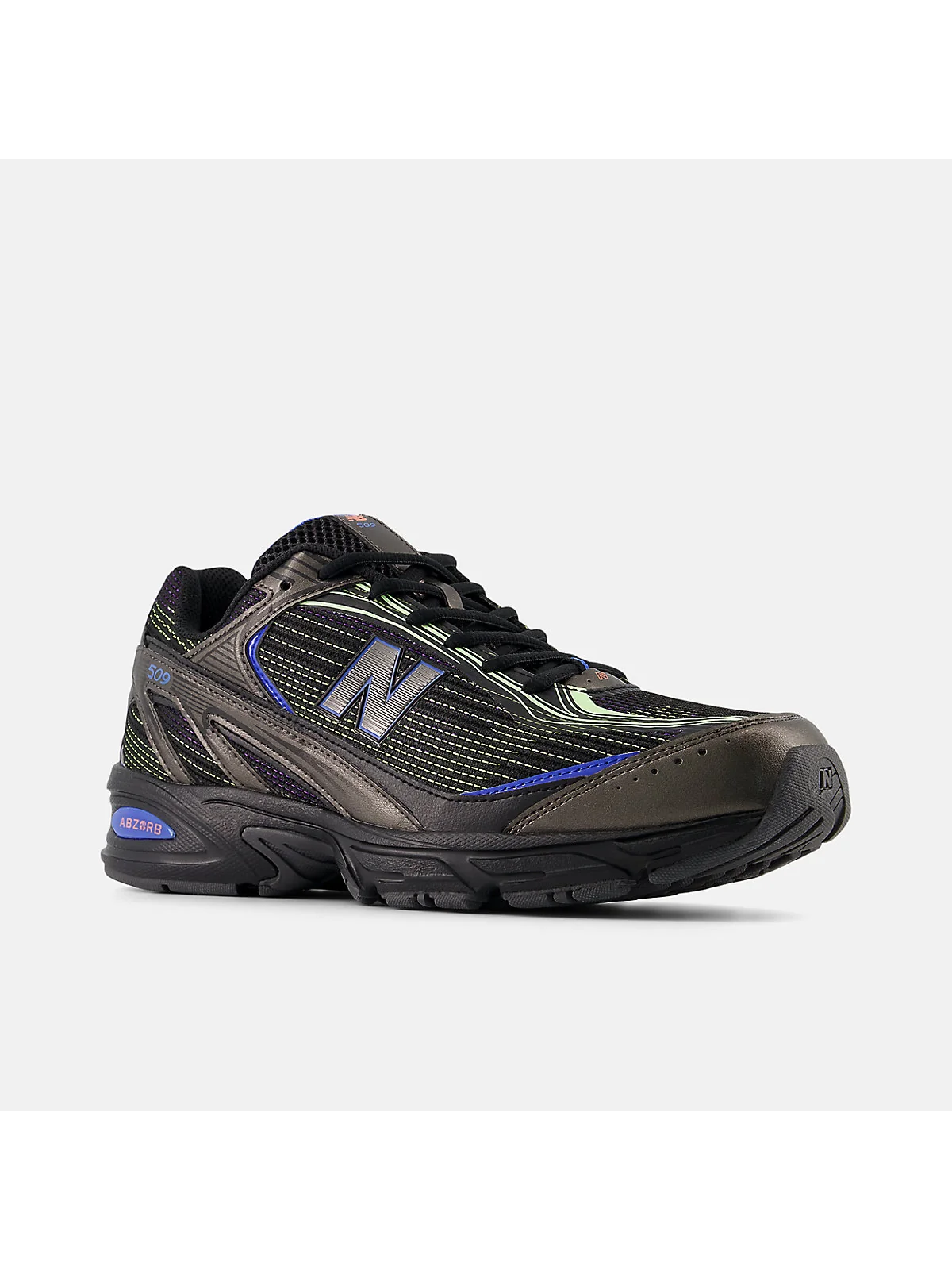 Многоцветные кроссовки New Balance 509 в боковом ракурсе с цветовым блоком.