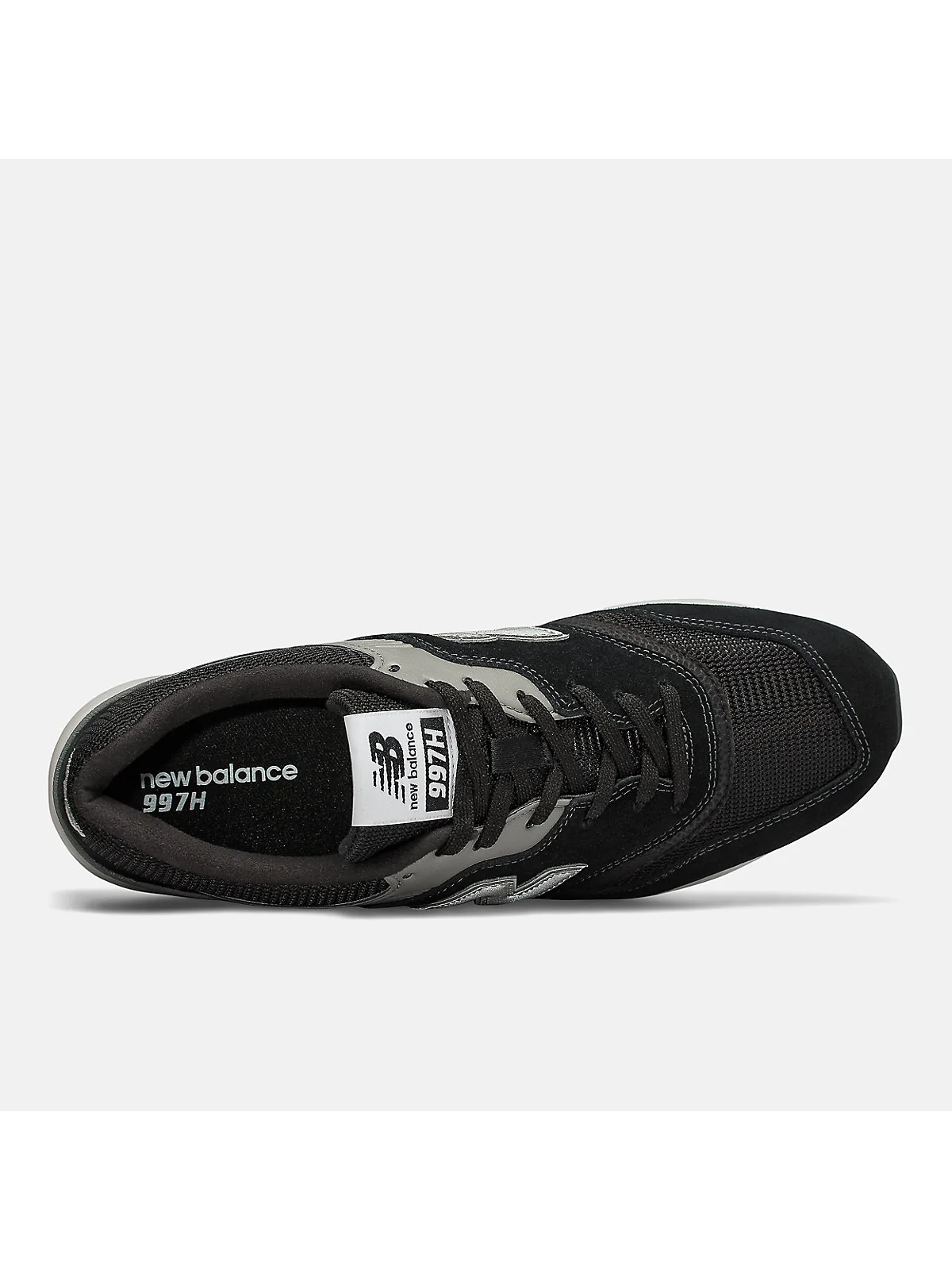Подошва чёрных кроссовок New Balance 997H с маркировками, вид сверху.