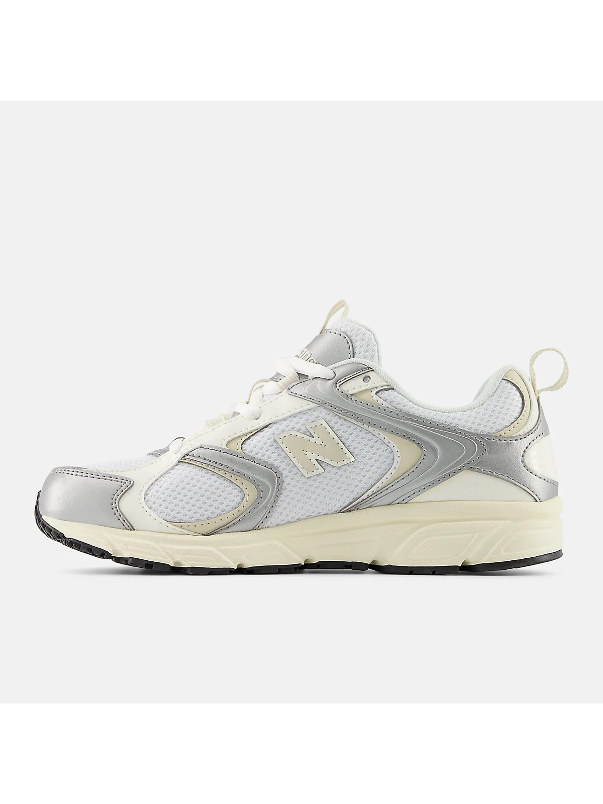 Вид сбоку серых кроссовок New Balance 408 с видимой подошвой и пяточной частью.
