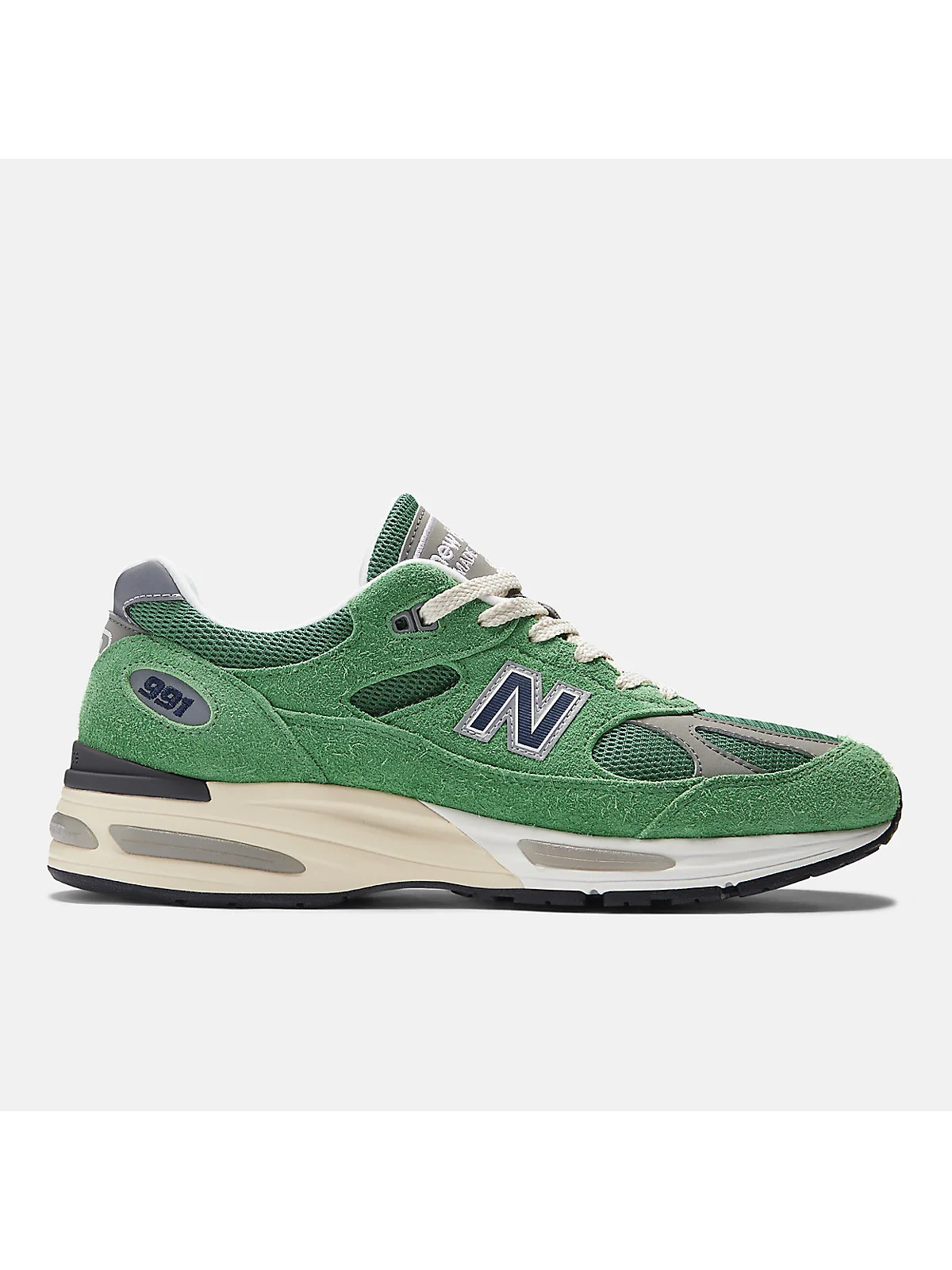 Кроссовки New Balance 991v2 Grounded голубые с эффектом денима, вид сбоку.