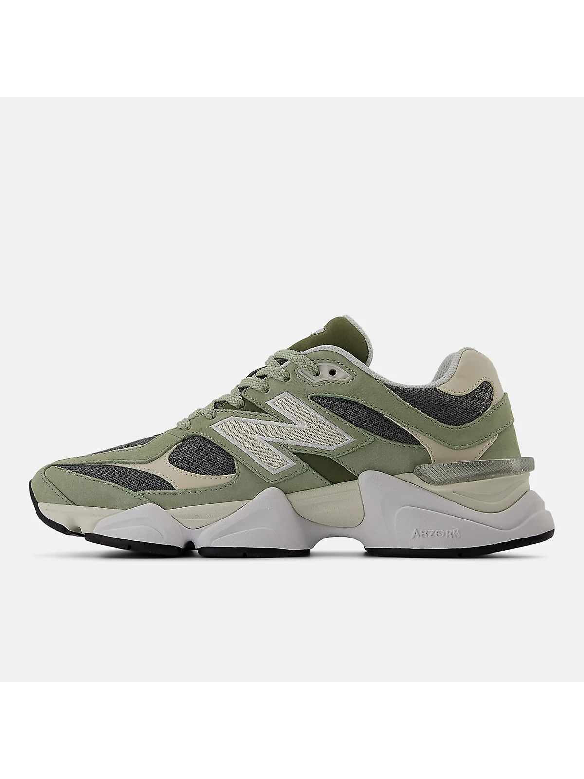 Крупный план верхней части кроссовок New Balance 9060 голубых, фактура материала.
