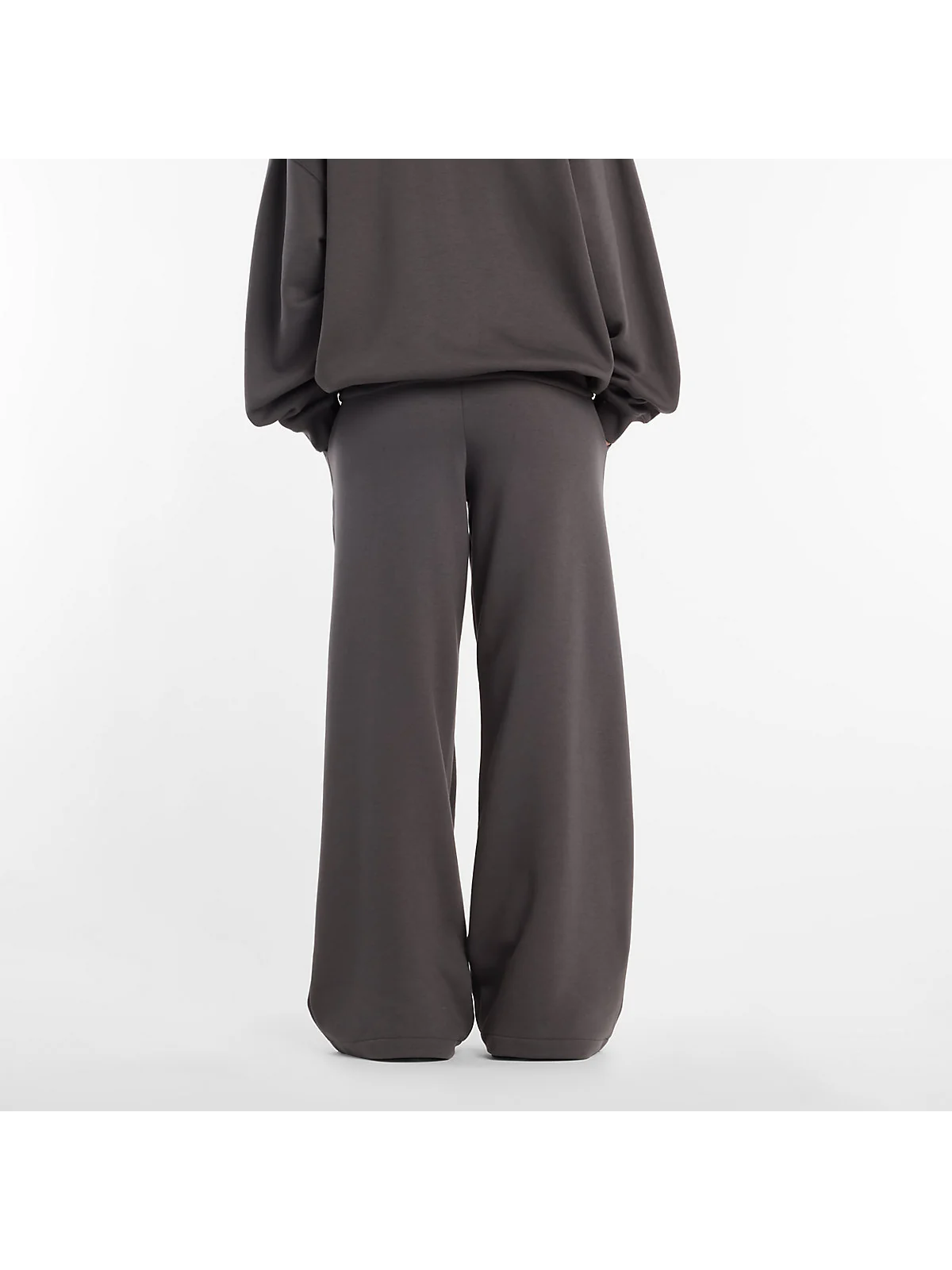 Брюки New Balance Reimagined Fleece черные — 4