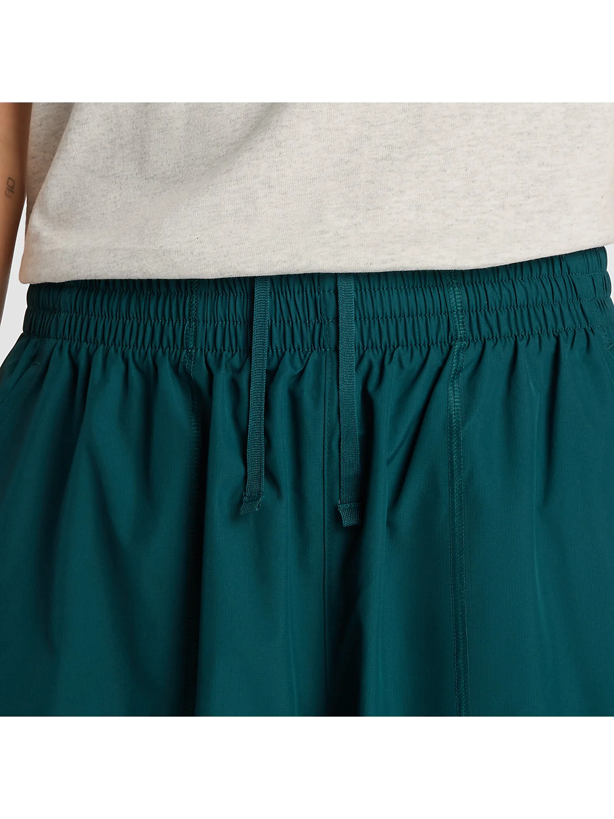 Женские брюки New Balance Trackside Woven — 3