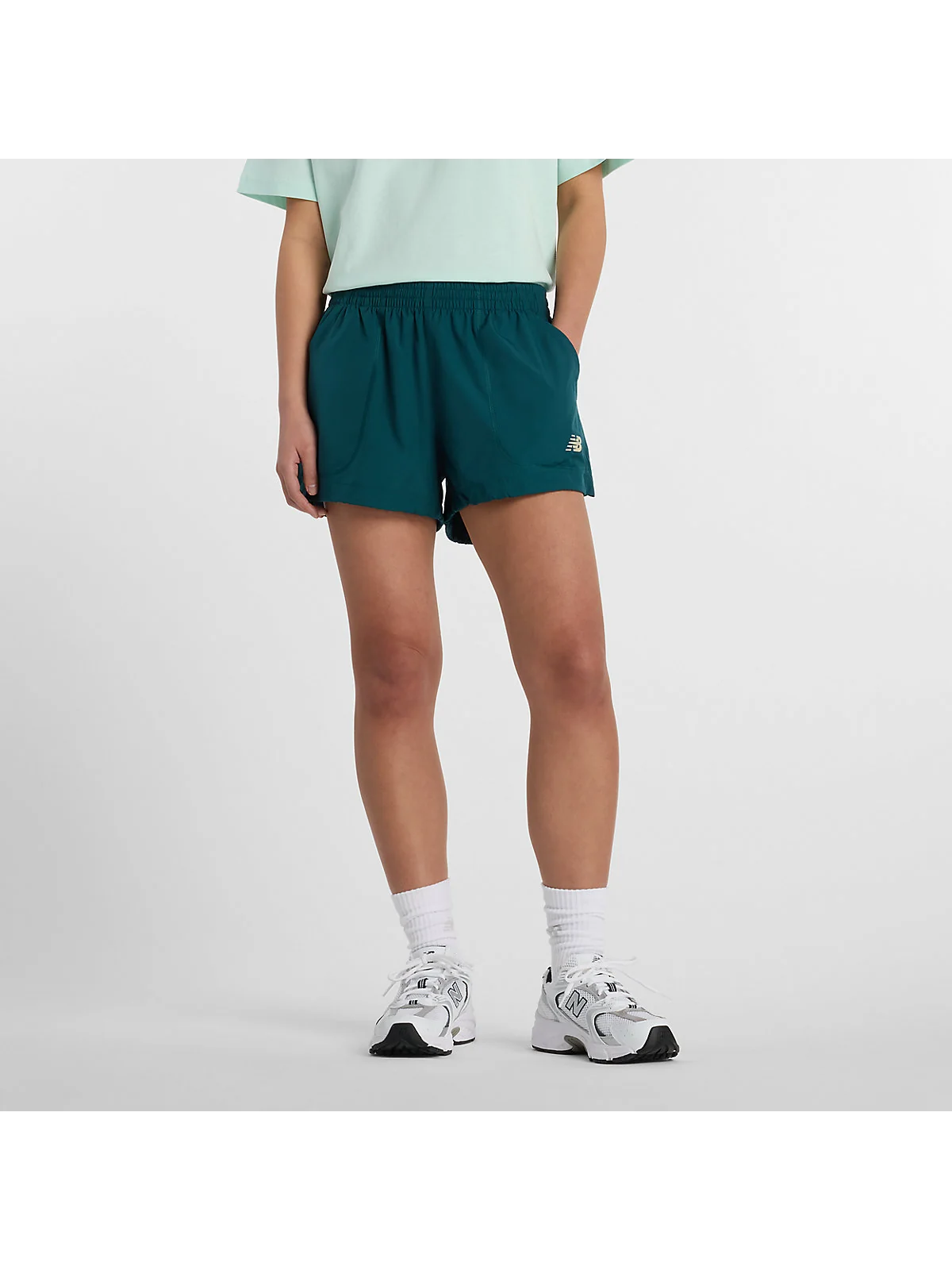 Женские шорты New Balance Trackside Woven — 1