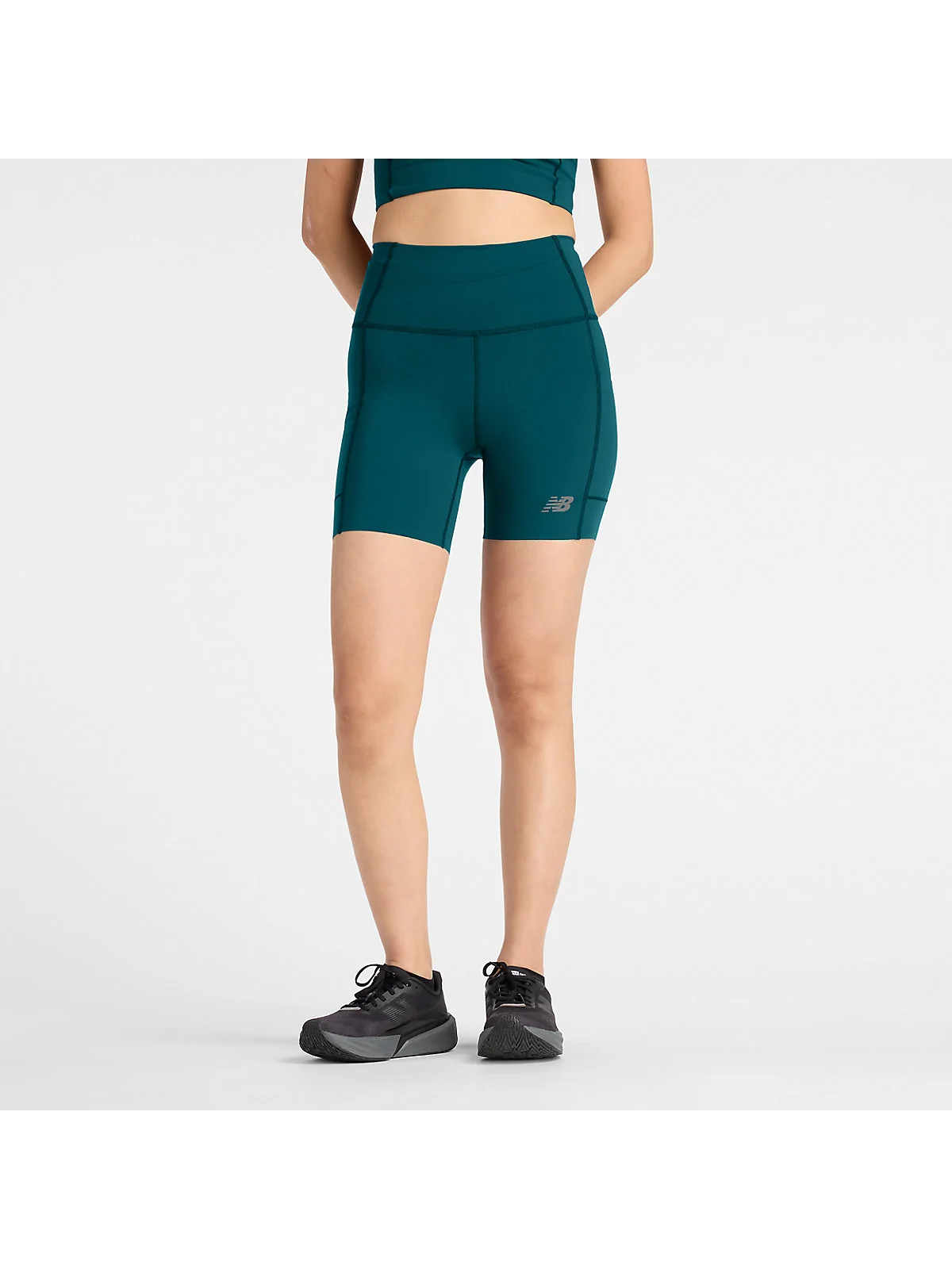 Женские шорты New Balance RC Elite Storage Short 6" — 1