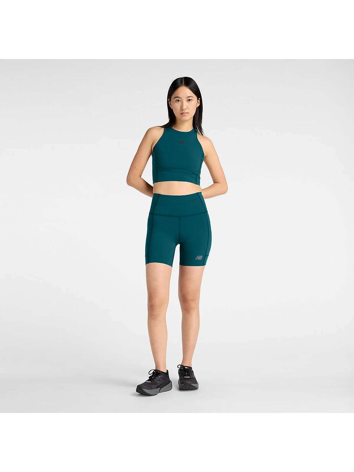 Женские шорты New Balance RC Elite Storage Short 6" — 2