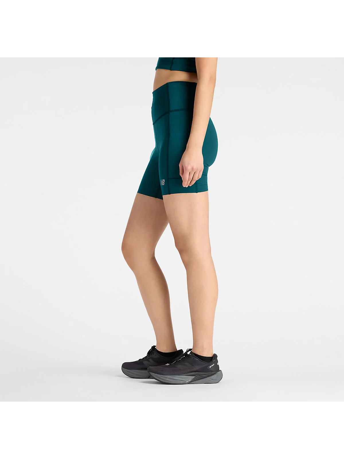 Женские шорты New Balance RC Elite Storage Short 6" — 5
