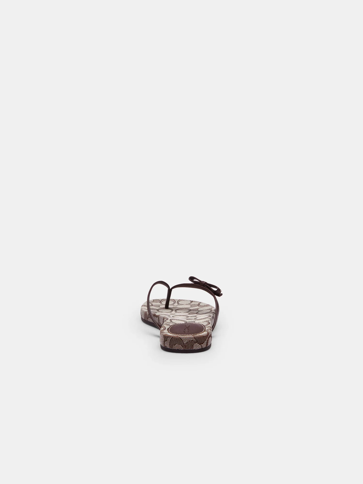 Шлёпанцы Coach с бантом из фирменного жаккарда — 18