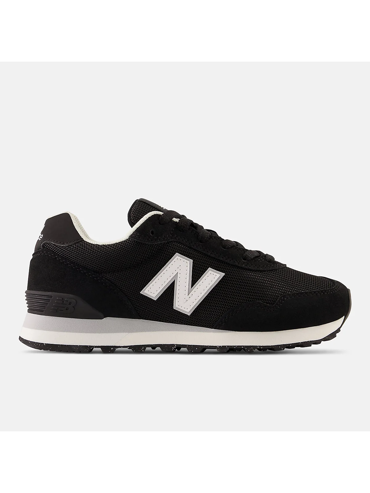 Тёмно-синие кроссовки New Balance 515 из кожи с белым логотипом, вид сбоку.