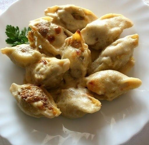 Фаршированные ракушки под соусом бешамель