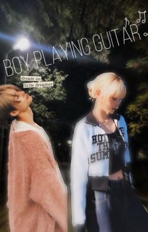 Boy playing the guitar