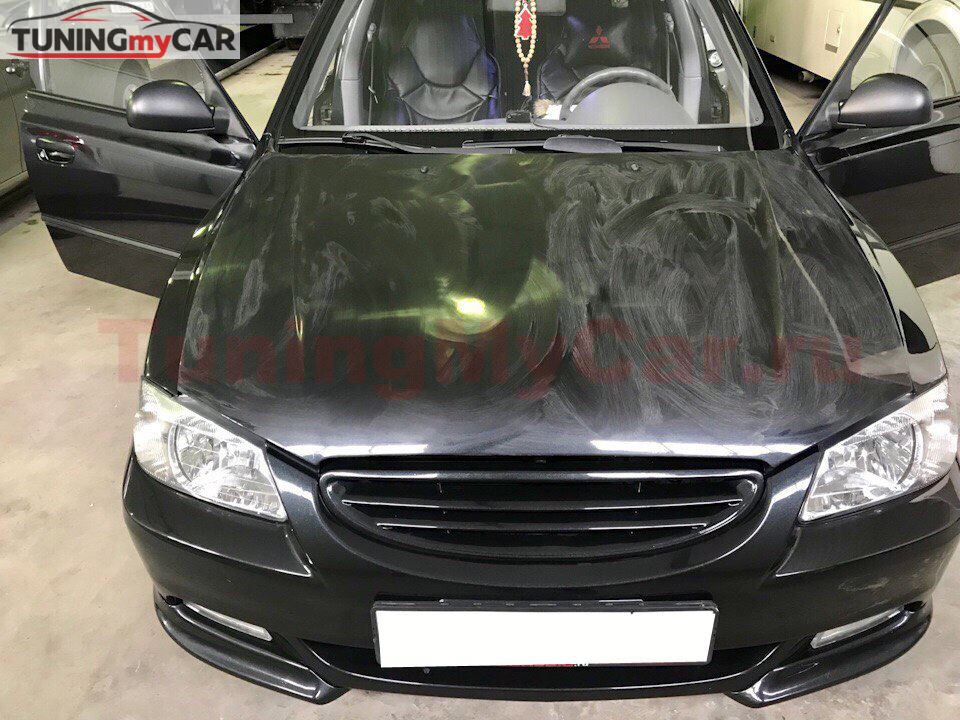Решетка радиатора Hyundai Accent (оригинал без значка) черный ГЛЯНЕЦ
