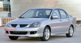 Накладка на передний бампер (юбка) Mitsubishi Lancer 9, тюнинг "Sport 2.0" (штатный-заводской обвес Спорт 2.0) 