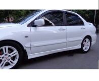 Накладки на внешние пороги Mitsubishi Lancer 9