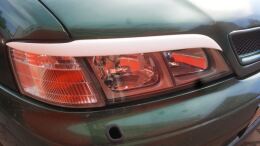 Реснички на фары для Nissan Primera HP11