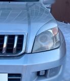 Накладки на фары крашеные в серебристый Toyota Land Cruiser Prado 120 2002-2009 (цвет 1D4 SILVER)
