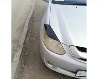 Реснички на фары для Toyota Caldina ZZT241 простая оптика 2002-2004