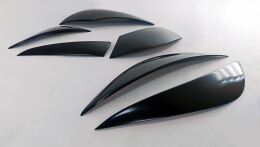 Тюнинг комплект накладок на передние фары и задние фонари для Opel Astra J 2009-2012