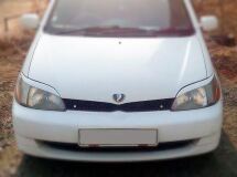 Реснички на фары для Toyota Platz SCP11 1999-2002