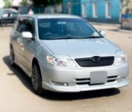 Реснички на фары для Toyota Corolla NZE 121 2000- (широкие)