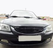 Решетка радиатора Hyundai Accent (три полосы глянец)